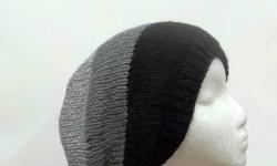 The colors of this gray stripe slouchy beanie hat are black, dark gray and light gray, it is made with a soft acrylic yarn, size large. It is suitable for men and women. Very stretchy, will fit any head, stretches out to 31 inches
around. Available at: