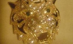 absolutely gorgeous lionshead pendant chain, lions head is covered with rhinestones, brand new , incredible detail, and the chain is a doubled chain dotted with little tiny balls of gold,,,exquisite....for women or men, nice long chain....$3.95 shipping