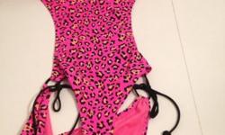Brand New with tags
Brand: BONGO
Juniors, Animal Lace, Pink Cheetah
Pictures show front & back but you can't see sides are open and held with black ties. Swim suit has push up bra built in.
Price paid: $42.00 clearly marked on the tag--Asking only $20