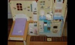 Excellent condition. Works perfectly.
Talking Barbie Doll House -- Over two feet tall
Adorable talking dollhouse that conveniently and easily folds to 15" x 5Â¼" x 29Â½".
2 bedroom townhouse with a bathroom, kitchen and living area.
The master bedroom has a