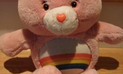 You are looking at a pink Care Bear from 2002. It is in very good condition. There are no rips, tears, spots, or blemishes. Seams are tight and intact.
?Care Bear measures about 14" tall
?The body has pink fur with a tuft of pink hair
?The belly is white