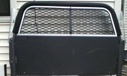 Taxi cab / police car security divider or safety gate.
I have for sale police car security dividers, very good shape,
Dimensions: 37-38" by 58-59"
More are available.
Call Andy 585-490-0392