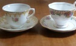 For sale are four tea cups and matching saucers. Below are the descriptions going from left to right in the picture of the four cups and saucers:
1 On back it says "Royal Stuart" and "Bone China Spencer Stuart England" and has the crown also. From early