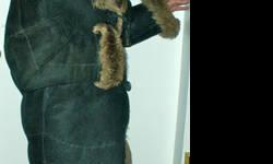 THIS IS A LADIES BLACK PERSIAN LAMB AND LEATHER COAT.
CUSTOM TAILORED IN THE USA BY MIDDLETOWN FURIERS. THE COAT IS FULLY LINED.
CONDITION:USED VERY GOOD
SIZE: 44" LONG SLEEVES ARE 21"
SHIPPING WEIGHT: 7 LBS
(OBO)