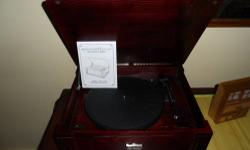 This is a like new THOMAS PACCONI CLASSICS MILLENIUM SERIES MODEL TPC-7470 RECORD PLAYER.
It plays 33 1/3, 45 & 78 rpm records
It has gotten little use.
I purchased it from QVC about 10 years ago with the idea that I would listen to my old 78 & 331/3