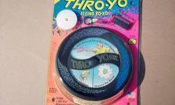 Vintage Thro-Yo Flying Yo-Yo Disc
The Most Amazing Flying Disc Ever Thrown.
The Thro-Yo Flying Yo-Yo disc offers all the excitement of a flying disc with the control and tricks of a yo-yo.
Toss the Thro-Yo disc like any other flying disc. When the Thro-Yo