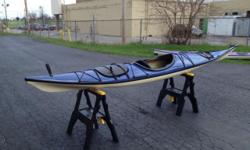 17'11" Fiberglass touring or sea kayak. Extremely stable, fast and reliable. You?ll never have a bad day on the water in this outfit. Plenty of dry storage for you gear for extended trips and there are plenty of tie downs on the hull too. Includes cockpit
