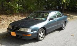 This is a 1997 Toyota Avalon XLS.The XLS is the top of the line model for that year.It was about $30,000 new.It is the"sister" car to the Lexus ES300.Only parts for the Avalon are Less$!It is roomier and rides nicer than a Camry,or Maxima.
It has Power