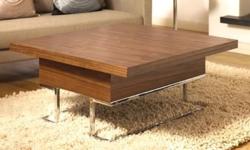 Very space-efficient coffee table, 3 ft x 3 ft, opens up and out into 6 ft x 3 ft dining table that seats 6 people. Large storage beneath. Perfect for New York apartments.
High-end piece made in Italy. It has a reliable heavy-duty mechanism for opening.