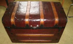 Steamer trunk metal clad with oak ribs in restored condition. Asking $75.00