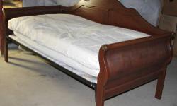 Twin size Day Bed in Sleigh style with curved wooden end panels, flat arched wooden back panel, in Very Good condition.
Size, in inches:
84-1/2 L, 40-1/4 D, 42 H
Platform: 17 to 18-3/4 H selectable during assembly.
Can disassemble for transport.
Includes