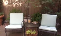 These 1940s wrought iron garden chairs can be used for eating as well as for lounging. CUs show general overall rust appropriate for their age. Includes cushions as shown.
27"W x 34.5"H x 25"D
Seat with cushion: 19.5"H