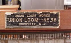 Nice old weaving loom.Approx. 4 feet wide.Union loom works Boonville N.Y. Used for weaving rugs.2 replaced slats.Done a while ago.