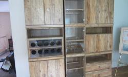 Used golden oak three piece wal unit-like new--dimentions-Length 78in
height 80in depth 17 inches..Has bar unit, storage draws shelves and glass display with light
