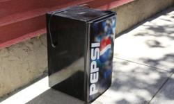 Used Pepsi branded fridge, good for small areas or garage. No longer needed as I've replaced with a large fridge. Asking $100 obo. Similar fridges at home depot linked below. Contact Mark 718-641-6219