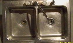 Still in good condition, no leaks. Faucet newer then sink. Pick up only. Hole size to install sink 21 X 32.