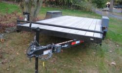 -trailer good for motorcycle or other items, easy unloading with tilt hinge
-Craftsman garden trailer