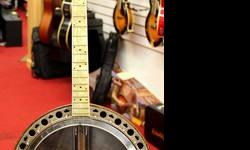 1928 Toneking Tenor Banjo made by William Lange, NY.
Vintage and Rare!
1928 Toneking Tenor Banjo built by William Lange for the NY Band Instrument Co.
Mahogany Resonator and drum
Raised tone ring
Pearloid Fretboard and Peghead
Mahogany neck with Maple