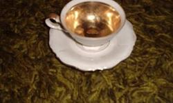 VINTAGE 1940?S CUP AND OVERSIZED SAUCER
IT APPEARS TO BE MADE FORM A TYPE GLASS WITH FLOWERED PRINT ON TOP
BOTTOM HAS A NON SLIP SURFACE MOLDED AS PART OF GLASS
SIZE: 10 Â¼? X 7 Â¼? Â½?
SHIPPING WEIGHT: 4 LBS
CONDITION: VERY GOOD