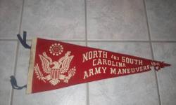 Vintage 1941 North and South Carolina Army Maneuvers Felt Pennant
Very Poor Condition- has a lot of wear, ripped, torn, dirt, dust particles, paint marks and black marks.
Approximately: 27 3/4 inches.
On the left side of the pennant all four tassles are