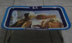 Vintage 1982 Universal City Studios Inc ET the Movie Metal Folding TV Lap Tray- Drew Barrymore.
Very Poor Condition- Front and back have alot of wear, dents, scratches, rust, glue marks, and marks.
Approx: 17 1/2 inches x 12 1/2 inches.
It slightly