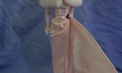 Reproduction of Barbie in her Enchanted Evening Gown and fur.