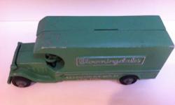 Vintage Bloomingdale's die cast model prototype delivery truck bank. Perfect for the collector who has everything and wants a one of a kind model addition.
Measures 8" in length, 3 1/4" in height with a 1/8" cast thickness. The interior is hollow to hold