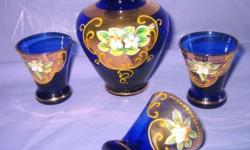 BOHEMIAN/CZECH BOHEMIAN ENAMELED HAND PAINTED GLASSWARE. Vintage. Hand blown and Baroque hand painted high relief enamel florals with gold accents and edges. Individually as indicated or the lot for $55
..Decanter Set for cordials. Cobalt blue bottle 5