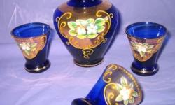 BOHEMIAN/CZECK GLASSWARE. Vintage. Hand blown and Baroque hand painted high relief enamel florals with gold accents and edges. Individually as indicated or the lot for $65
..Decanter Set for cordials of cobalt blue bottle and 10 glasses. $50 the set