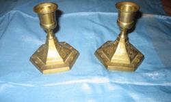 These candlesticks are 3 1/4 inches tall and are 60 to 70 years old. The price for the pair is $12.
Also available is a brass silent butler(used to sweep off crumbs from the table) that measures 7 inches wide by 2 inches high and is 40 to 50 years old. It