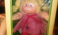 you can email me at ecogreenassociates1 AT gmail DOT com
I have here for sale a vintage bought in 1984, NEVER OPENED, STILL IN BOX, Cabbage Patch Doll. Has all sealed original papers and birth certificate.
This doll is in PERFECT CONDITION AND ALL