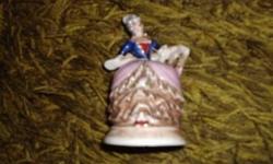 VINTAGE CERAMIC HAND PAINTED FIGURINE GROUP,
ONE WOMEN PLAYING A KEYBOARD WITH A COUPLE DANCING
IN VERY GOOD CONDITION
I THINK IT SAYS IT IS MADE IN OCCUPIED JAPAN, AS THIS IS SMUDGED AND HARD TO READ.
SIZE: 2? X 3 Â¾? X 5 1/8?
SHIPPING WEIGHT: 2 LBS.