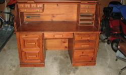 Highland design is known for quality (long lasting) furniture. This desk is solid wood!! Needs some minor restoration and refinishing, but is complete with draws and all metal handles. It measures 5 feet in length, 4 feet 1 inch in height and 29 inches