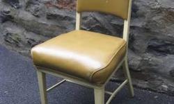 I have several vintage steel office/side chairs to choose from. This one has the original yellow vinyl seat covering. I also have a similar one in a red and another in green. They're very sturdy and in good condition for their age. These chairs are