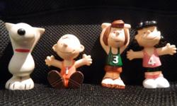 You are looking at a set of four vintage Peanuts sports figures. All the pieces are in good condition; however, there are minor marks, scratches, and fading to be expected with toys of this age.
Charlie Brown is dated 1950; Snoopy is dated 1958, 1966;