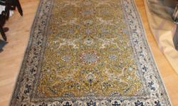 QUM RUG FROM IRAN PURCHASED FROM IRANIAN BROTHERHOOD OF RUG WEAVERS AUCTION IN 1971.
BRIGHT YELLOW IN QUM RUG IS UNUSUAL. ALL WOOL WITH INLAID SILK DETAILS. QUM RUGS ARE KNOWN FOR A VERY FINE, DENSE WEAVE. THE REVERSE SIDE (SEE PICTURE WITH FRINGE) SHOWS
