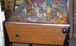 This is a 3/4 scale or small size used pinball machine in working order. It is model STAR EXPLORER made by Sentinel. Model Number PH7730WA05. Made sometime around 1977. Perfect for a man cave or child's bedroom.
This is NOT coin operated and works free