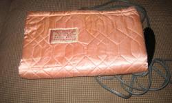 This Westinghouse heating pad worked when last used. It probably needs to be rewired as the wires are somewhat frayed. It is vintage probably from the 1960s and comes in the original box and is a collectible unto itself. It is being sold as is.
Pictured