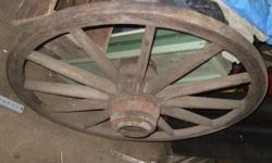 Two Antique Wagon Wheels, Rim 1.75? wide x 45.00? high. If your decorating scheme leans toward western or rustic, you will find the Antique Wagon Wheel irresistible! These wagon wheels are as authentic as they get and are a true relic from earlier times