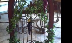 Beautifully designed with vines and grapes along with a little bird
Frame is cherry colored wood
inside is like wrought iron
A beautiful piece for any home
call Mary 315-440-8113, 315-317-0344
Please call or text I do not answer emails.