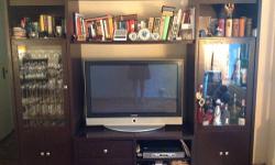 Cherry wall unit great condition.Make offer. Cant get picture on this site but there is a pic on craigs list under wall unit Cherry.