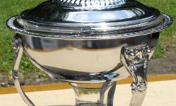 1). SILVERPLATED WARMING CHAFER WITH 1 1/2 QT. CAPACITY ANCHOR HOCKING GLASS INSERT AND CANDLE HOLDER SHOTGLASS.
ELEGANT LOOK AT ANY PARTY!------------------$15.00
2). CUT CRYSTAL SERVING BOWL MADE IN FRANCE BY ARCOROC. 9 INCHES DIAMETER & 4 1/2 INCHES