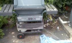 Weber Genesis Silver Grill with propane tank (partially filled) and grill cover. Great grill...retails new for approximately $500. Great for someone who wants a good grill but at a steeply discounted price.
