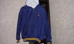 West Genesee Wildcats hooded, 1/2 zip front, cotton-lined nylon windbreaker, size XL or XXL, stripe ribbed cuff and bottom, kangaroo pocket on front, Wildcats logo on back, personalized with "Joe" on chest
excellent condition, worn only one season, sells