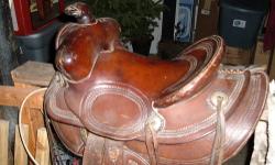 I have a nice leather saddle for sale. It measures 15" from the horn to the top of the seat and 12" from the lower front to the lower back. Check out the pics. Please call : (607)589-7623
