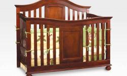 The beautiful Westin 4-in-1 Crib with its graceful sleigh design is a stunning centerpiece for any nursery. Built with strong wood construction, it's designed for multiple stages of life. This versatile crib converts to a toddler bed, to a daybed, and to