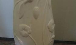 white ceramic umbrella stand 18 1/2" high, 7 3/4" wide, has noticeable crack
may be useful for artists to repurpose