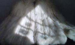 White Fox Fur Coat has never been worn, I also have a Mink Coat (used), both in great condition! For a medium size women! $100.00 each! This is a great buy, both coats were in the thousands.