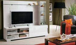GEORGEOUS REFLECTIVE WHITE LACQUER AND GLASS TV WALL UNIT. GLASS SIDE BAR WITH 5 GLASS DOORED COMPARTMENTS FOR DVDS & REMOTES. SLEEK DIMENSIONS~
THE BASE HAS SLIDING DOOR THAT COVERS ONE ALTERNATE SIDE OF BASE 73" LONG ,19" HIGH, 20" DEEP. LEFT SIDE WITH