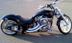 2003 Wild West Vigilante. Pro Street Chopper. Soft tail w progressive shocks. Inverted front forks. Factory built. 6k miles. Baker 6 speed right side drive. Primo 3 inch open primary, carbon fiber fenders, 107 S&S polished motor, Martin Brothers exhaust,
